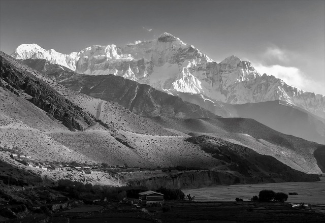 Annapurna Foothill Resorts Framed by prayer flags and highland quiet