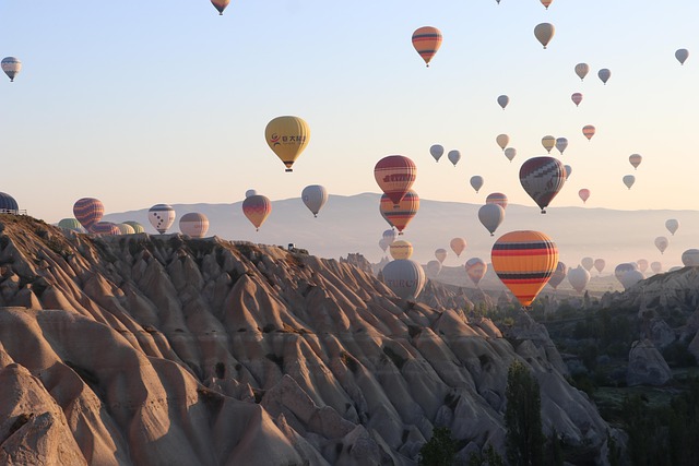 Cappadocia Travel Carried by sunrise balloons and warm cave light
