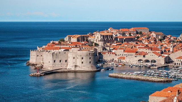 Dubrovnik Travel Bright with stone walls, island views, and summer rhythm